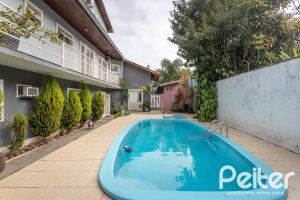 Casa à venda com 334m², 4 dormitórios, 2 suítes, 4 vagas, no bairro Jardim Isabel em Porto Alegre