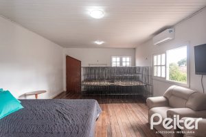 Casa à venda com 334m², 4 dormitórios, 2 suítes, 4 vagas, no bairro Jardim Isabel em Porto Alegre