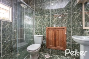 Casa à venda com 334m², 4 dormitórios, 2 suítes, 4 vagas, no bairro Jardim Isabel em Porto Alegre