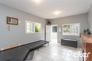 Casa à venda com 334m², 4 dormitórios, 2 suítes, 4 vagas, no bairro Jardim Isabel em Porto Alegre