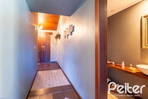 Casa em Condomínio à venda com 315m², 3 dormitórios, 3 suítes, 4 vagas, no bairro Cavalhada em PORTO ALEGRE