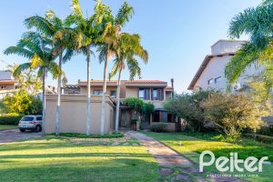 Casa em Condomínio à venda com 315m², 3 dormitórios, 3 suítes, 4 vagas, no bairro Cavalhada em PORTO ALEGRE