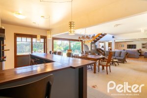 Casa em Condomínio à venda com 315m², 3 dormitórios, 3 suítes, 4 vagas, no bairro Cavalhada em PORTO ALEGRE