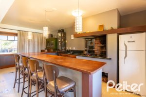 Casa em Condomínio à venda com 315m², 3 dormitórios, 3 suítes, 4 vagas, no bairro Cavalhada em PORTO ALEGRE