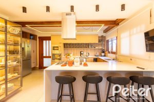 Casa em Condomínio à venda com 315m², 3 dormitórios, 3 suítes, 4 vagas, no bairro Cavalhada em PORTO ALEGRE