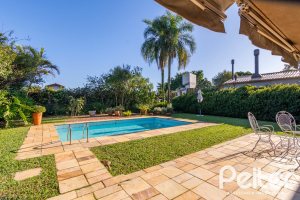 Casa em Condomínio à venda com 315m², 3 dormitórios, 3 suítes, 4 vagas, no bairro Cavalhada em PORTO ALEGRE