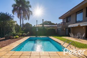 Casa em Condomínio à venda com 315m², 3 dormitórios, 3 suítes, 4 vagas, no bairro Cavalhada em PORTO ALEGRE