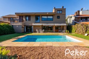 Casa em Condomínio à venda com 315m², 3 dormitórios, 3 suítes, 4 vagas, no bairro Cavalhada em PORTO ALEGRE