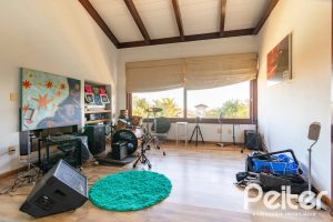 Casa em Condomínio à venda com 315m², 3 dormitórios, 3 suítes, 4 vagas, no bairro Cavalhada em PORTO ALEGRE