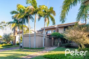 Casa em Condomínio à venda com 315m², 3 dormitórios, 3 suítes, 4 vagas, no bairro Cavalhada em PORTO ALEGRE