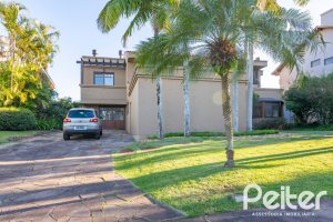 Casa em Condomínio à venda com 315m², 3 dormitórios, 3 suítes, 4 vagas, no bairro Cavalhada em PORTO ALEGRE