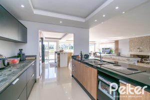Casa em Condomínio à venda com 349m², 5 dormitórios, 5 suítes, 4 vagas, no bairro Terra Ville em PORTO ALEGRE
