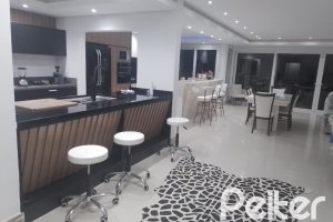 Casa em Condomínio à venda com 349m², 5 dormitórios, 5 suítes, 4 vagas, no bairro Terra Ville em PORTO ALEGRE