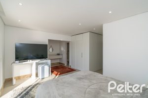 Casa em Condomínio à venda com 349m², 5 dormitórios, 5 suítes, 4 vagas, no bairro Terra Ville em PORTO ALEGRE