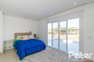 Casa em Condomínio à venda com 349m², 5 dormitórios, 5 suítes, 4 vagas, no bairro Terra Ville em PORTO ALEGRE