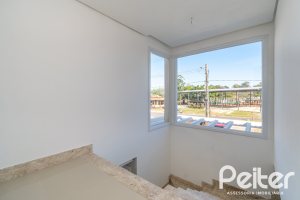 Casa em Condomínio à venda com 349m², 5 dormitórios, 5 suítes, 4 vagas, no bairro Terra Ville em PORTO ALEGRE