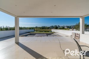 Casa em Condomínio à venda com 349m², 5 dormitórios, 5 suítes, 4 vagas, no bairro Terra Ville em PORTO ALEGRE