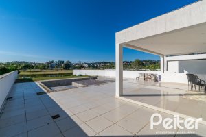 Casa em Condomínio à venda com 349m², 5 dormitórios, 5 suítes, 4 vagas, no bairro Terra Ville em PORTO ALEGRE