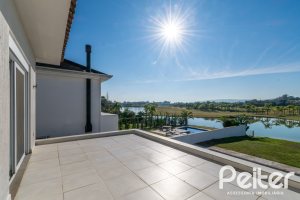 Casa em Condomínio à venda com 349m², 5 dormitórios, 5 suítes, 4 vagas, no bairro Terra Ville em PORTO ALEGRE