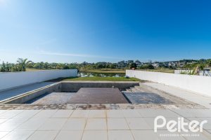 Casa em Condomínio à venda com 349m², 5 dormitórios, 5 suítes, 4 vagas, no bairro Terra Ville em PORTO ALEGRE