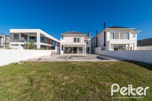 Casa em Condomínio à venda com 349m², 5 dormitórios, 5 suítes, 4 vagas, no bairro Terra Ville em PORTO ALEGRE