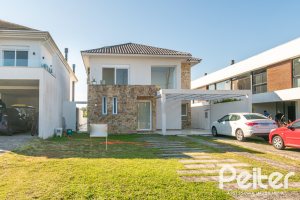 Casa em Condomínio à venda com 349m², 5 dormitórios, 5 suítes, 4 vagas, no bairro Terra Ville em PORTO ALEGRE