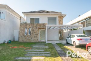 Casa em Condomínio à venda com 349m², 5 dormitórios, 5 suítes, 4 vagas, no bairro Terra Ville em PORTO ALEGRE