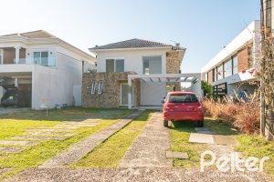 Casa em Condomínio à venda com 349m², 5 dormitórios, 5 suítes, 4 vagas, no bairro Terra Ville em PORTO ALEGRE