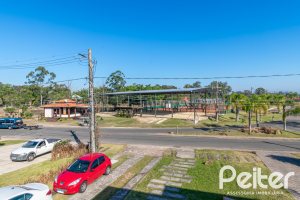 Casa em Condomínio à venda com 349m², 5 dormitórios, 5 suítes, 4 vagas, no bairro Terra Ville em PORTO ALEGRE