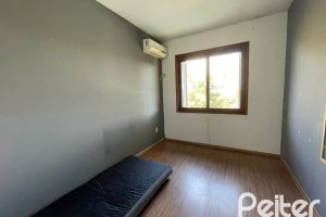 Casa em Condomínio à venda com 98m², 3 dormitórios, 1 suíte, 2 vagas, no bairro Espírito Santo em Porto Alegre