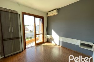 Casa em Condomínio à venda com 98m², 3 dormitórios, 1 suíte, 2 vagas, no bairro Espírito Santo em Porto Alegre