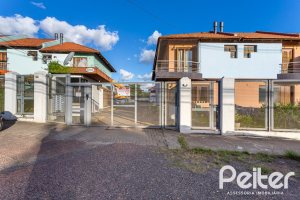 Casa em Condomínio à venda com 98m², 3 dormitórios, 1 suíte, 2 vagas, no bairro Espírito Santo em Porto Alegre