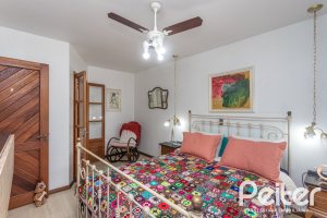 Casa à venda com 308m², 4 dormitórios, 1 suíte, 2 vagas, no bairro Ipanema em Porto Alegre