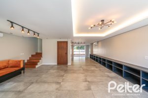 Casa em Condomínio à venda com 248m², 3 dormitórios, 2 suítes, 2 vagas, no bairro Vila Nova em Porto Alegre