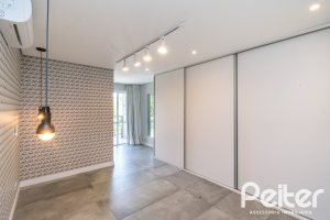 Casa em Condomínio à venda com 248m², 3 dormitórios, 2 suítes, 2 vagas, no bairro Vila Nova em Porto Alegre