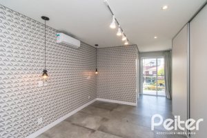 Casa em Condomínio à venda com 248m², 3 dormitórios, 2 suítes, 2 vagas, no bairro Vila Nova em Porto Alegre