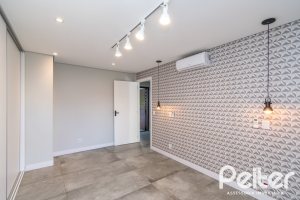 Casa em Condomínio à venda com 248m², 3 dormitórios, 2 suítes, 2 vagas, no bairro Vila Nova em Porto Alegre