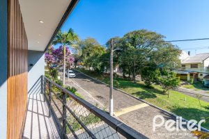 Casa em Condomínio à venda com 248m², 3 dormitórios, 2 suítes, 2 vagas, no bairro Vila Nova em Porto Alegre