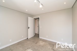 Casa em Condomínio à venda com 248m², 3 dormitórios, 2 suítes, 2 vagas, no bairro Vila Nova em Porto Alegre