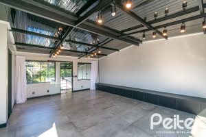 Casa em Condomínio à venda com 248m², 3 dormitórios, 2 suítes, 2 vagas, no bairro Vila Nova em Porto Alegre