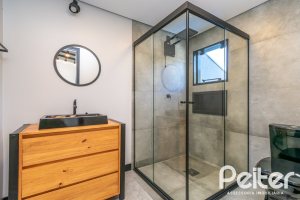 Casa em Condomínio à venda com 248m², 3 dormitórios, 2 suítes, 2 vagas, no bairro Vila Nova em Porto Alegre