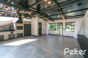 Casa em Condomínio à venda com 248m², 3 dormitórios, 2 suítes, 2 vagas, no bairro Vila Nova em Porto Alegre