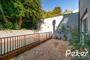 Casa em Condomínio à venda com 248m², 3 dormitórios, 2 suítes, 2 vagas, no bairro Vila Nova em Porto Alegre