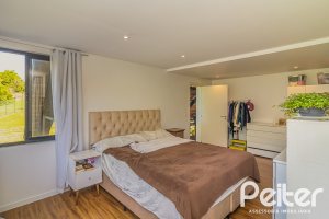 Casa em Condomínio à venda com 395m², 4 dormitórios, 4 suítes, 4 vagas, no bairro Alphaville em PORTO ALEGRE