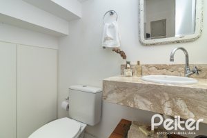 Casa em Condomínio à venda com 189m², 3 dormitórios, 1 suíte, 3 vagas, no bairro Tristeza em Porto Alegre