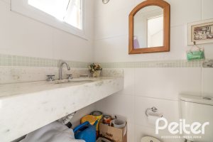 Casa em Condomínio à venda com 189m², 3 dormitórios, 1 suíte, 3 vagas, no bairro Tristeza em Porto Alegre