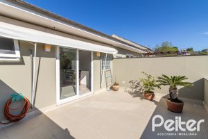 Casa em Condomínio à venda com 189m², 3 dormitórios, 1 suíte, 3 vagas, no bairro Tristeza em Porto Alegre