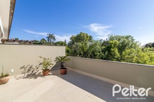 Casa em Condomínio à venda com 189m², 3 dormitórios, 1 suíte, 3 vagas, no bairro Tristeza em Porto Alegre