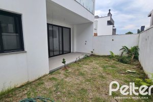 Casa em Condomínio à venda com 216m², 3 dormitórios, 3 suítes, 2 vagas, no bairro Ipanema em Porto Alegre