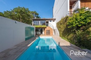 Casa em Condomínio à venda com 229m², 3 dormitórios, 3 suítes, 4 vagas, no bairro Cristal em Porto Alegre